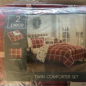 Twin Comforter with Sham. Brand new still in sealed packaging.
